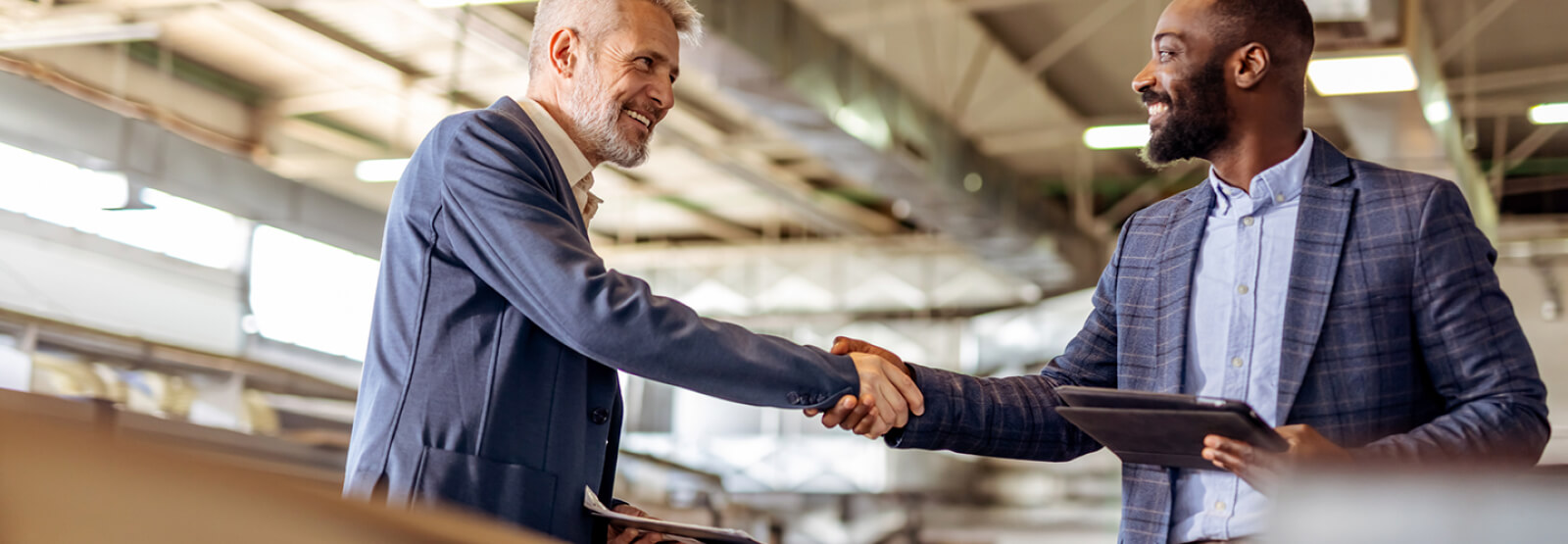 Two businessmen shaking hands